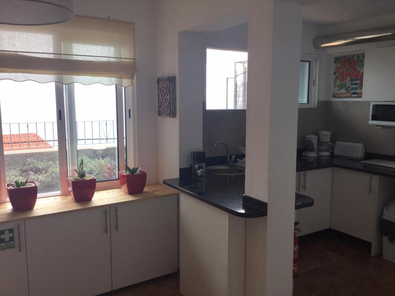 Banda Do Sol Self Catering Cottages Estreito Da Calheta Luaran gambar